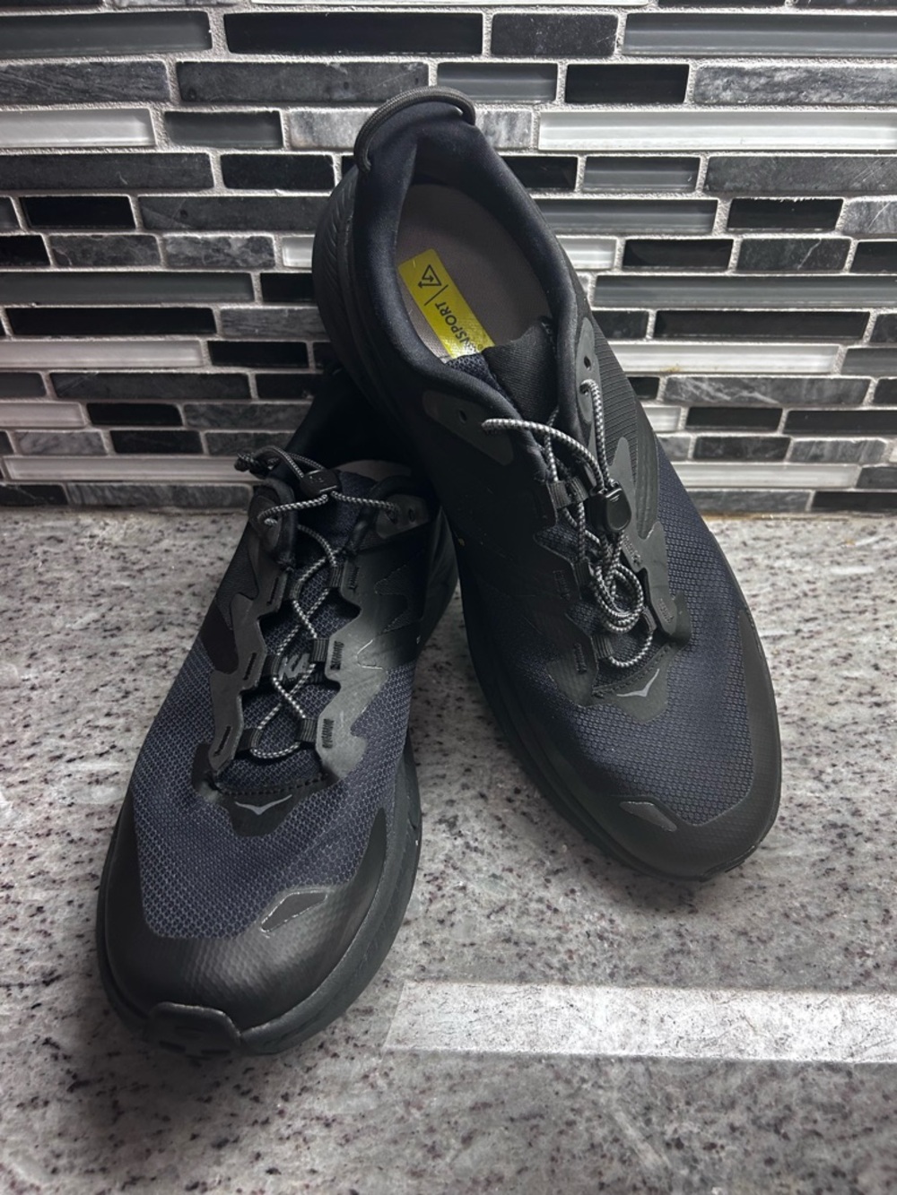 Hoka One One Transport mens Triple Black Athletic Sneakers size 10